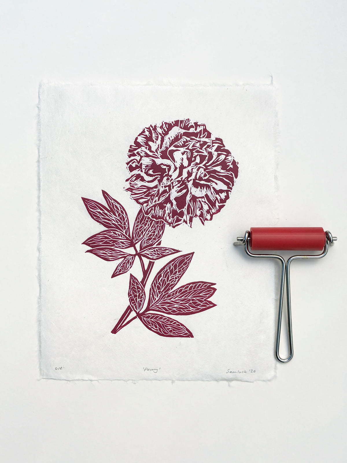 Red peony botanical wall art with a ink printmaking roller, created by Sam Luck, UK.