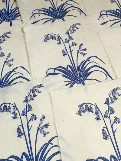 Print edition of handcrafted and printed bluebell linocut art.