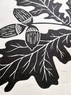 Close up detail of oak leaf and acorn botanical linocut print by Sam Luck, artist, UK.