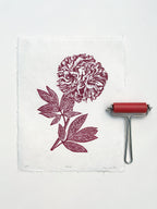 Red peony botanical wall art with a ink printmaking roller, created by Sam Luck, UK.