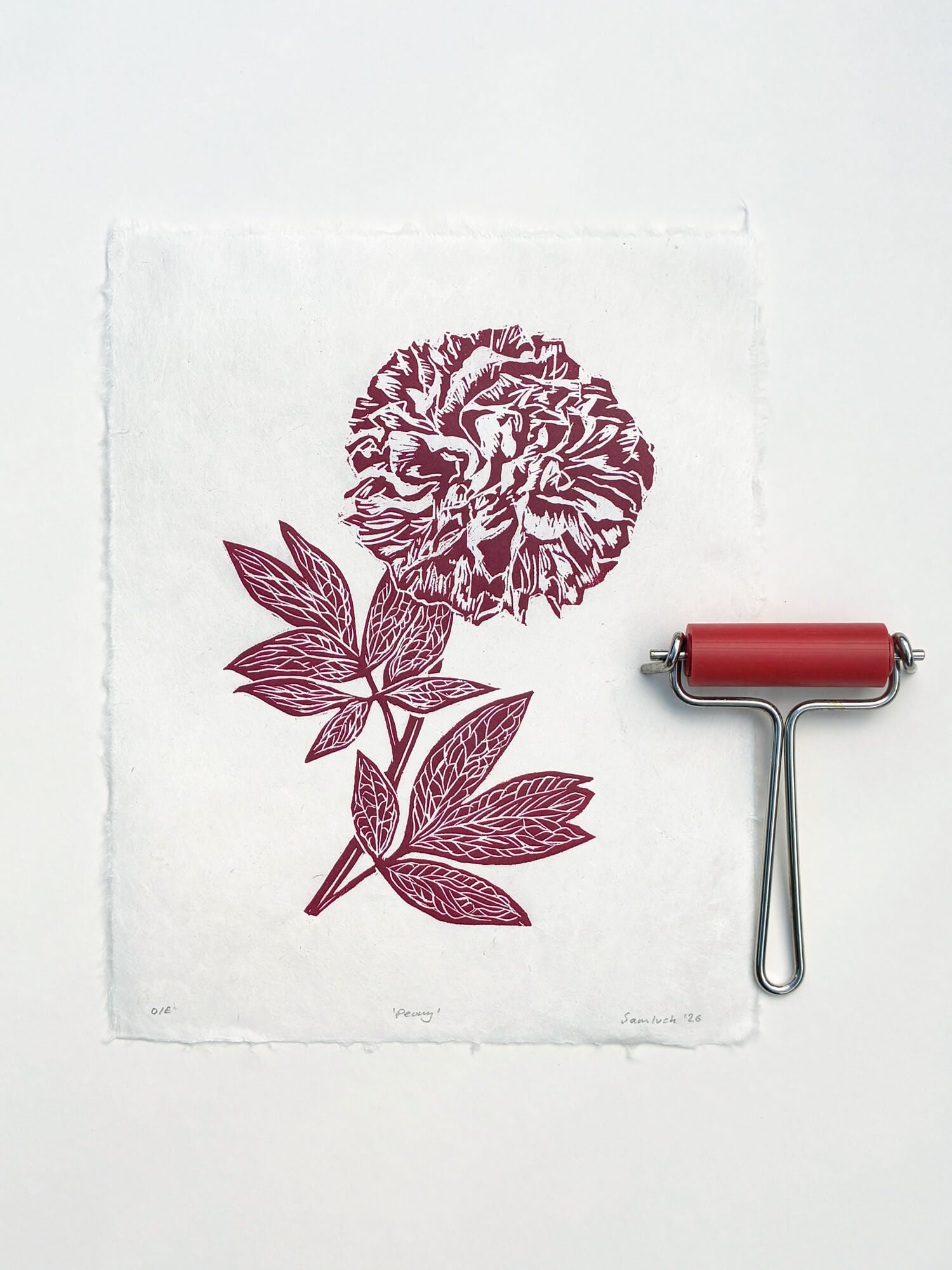 Red peony botanical wall art with a ink printmaking roller, created by Sam Luck, UK.