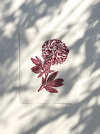 Red peony wall art print with soft plant shadows. Linocuts by Sam Luck printmaker, Hampshire, UK.